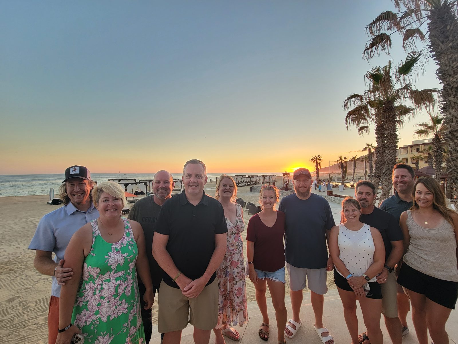 Members on the beach at sunset in Cabo on a Fuel Retreat